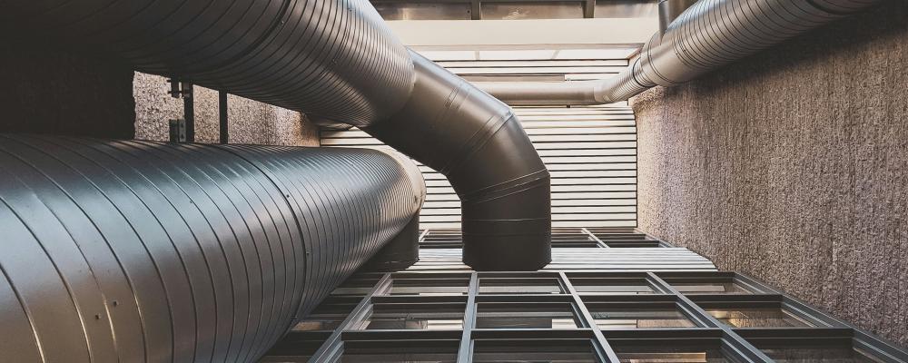 Gråa metallrör. Foto: Compagnons / Unsplash