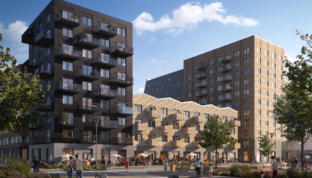En vy av Kompositören, bestående av tre huskroppar med varierad arkitektur och materialval. Foto: Wallenstam